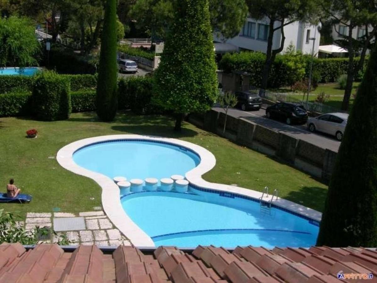 Appartamento Genziana - Con Vista Piscina E Garage Sirmione Bagian luar foto